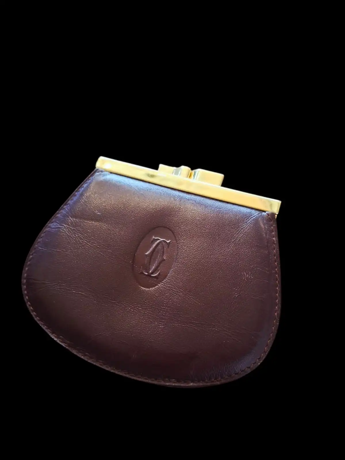 Cartier Porte monnaie femme Cartier en cuir bordeau fermoir doré