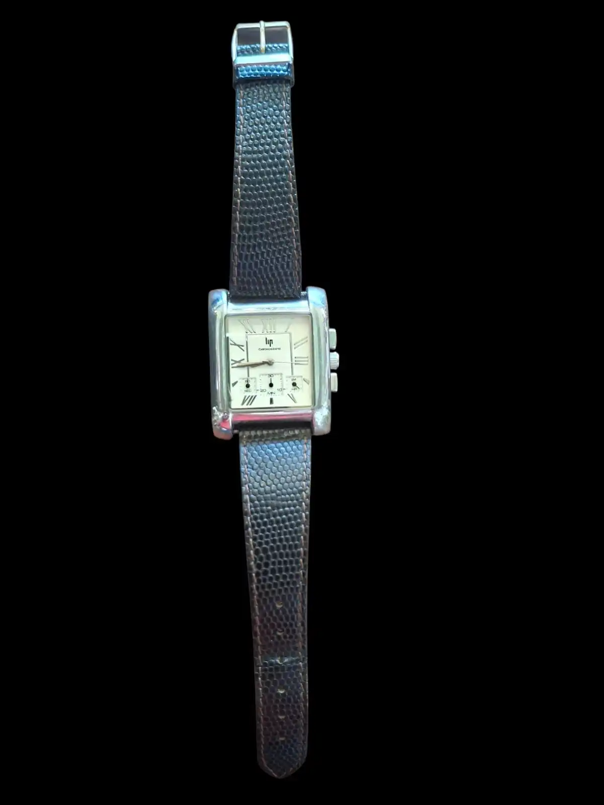 LIP Montre LIP homme acier  bracelet cuir marron . Pile à changer