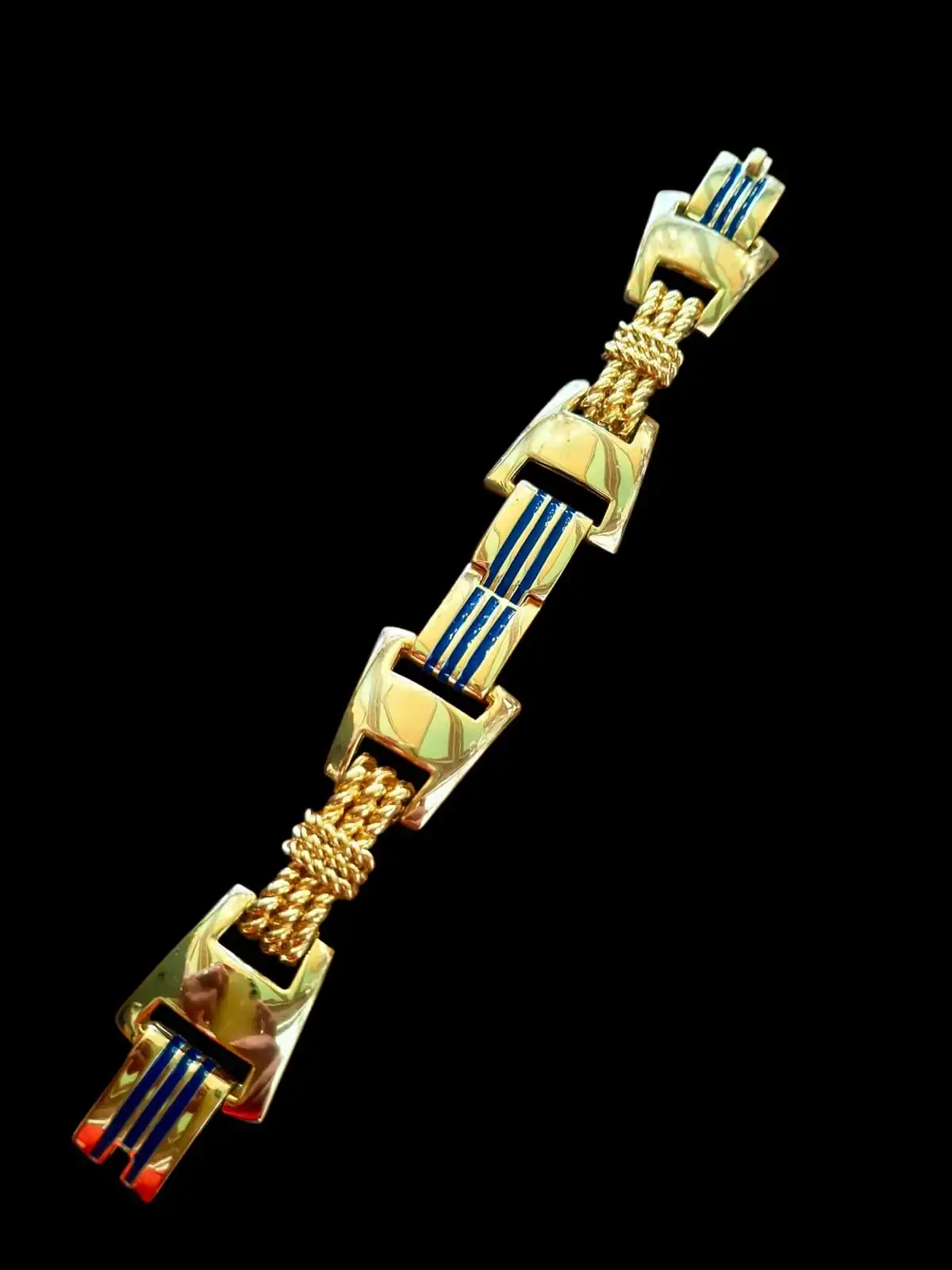 HELENA RUBINSTEIN Bracelet massif doré aux détails marine . HELENA RUBINSTEIN